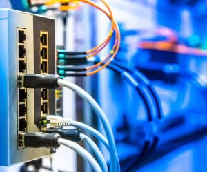 Electrical Circuits.  The electric wire behind the control board with lighting effect,Industrial Electrical Concept. Wiring PLC Control panel with wires industrial factory